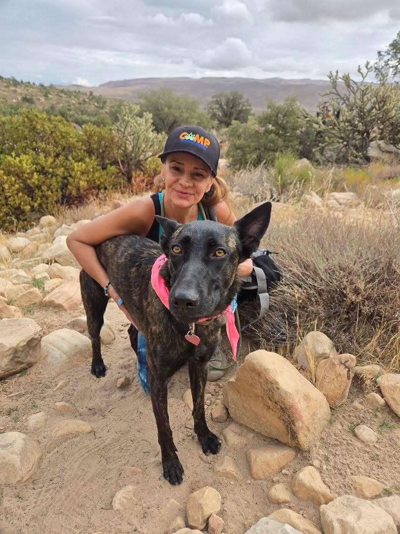 Sunset, the German Shepherd mix who inspired Lost & Found Animal Foundation, with founder Arina Hanciulescu